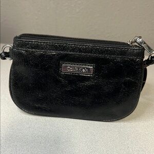 Calvin Klein Black Leather Clutch with Silver Accents